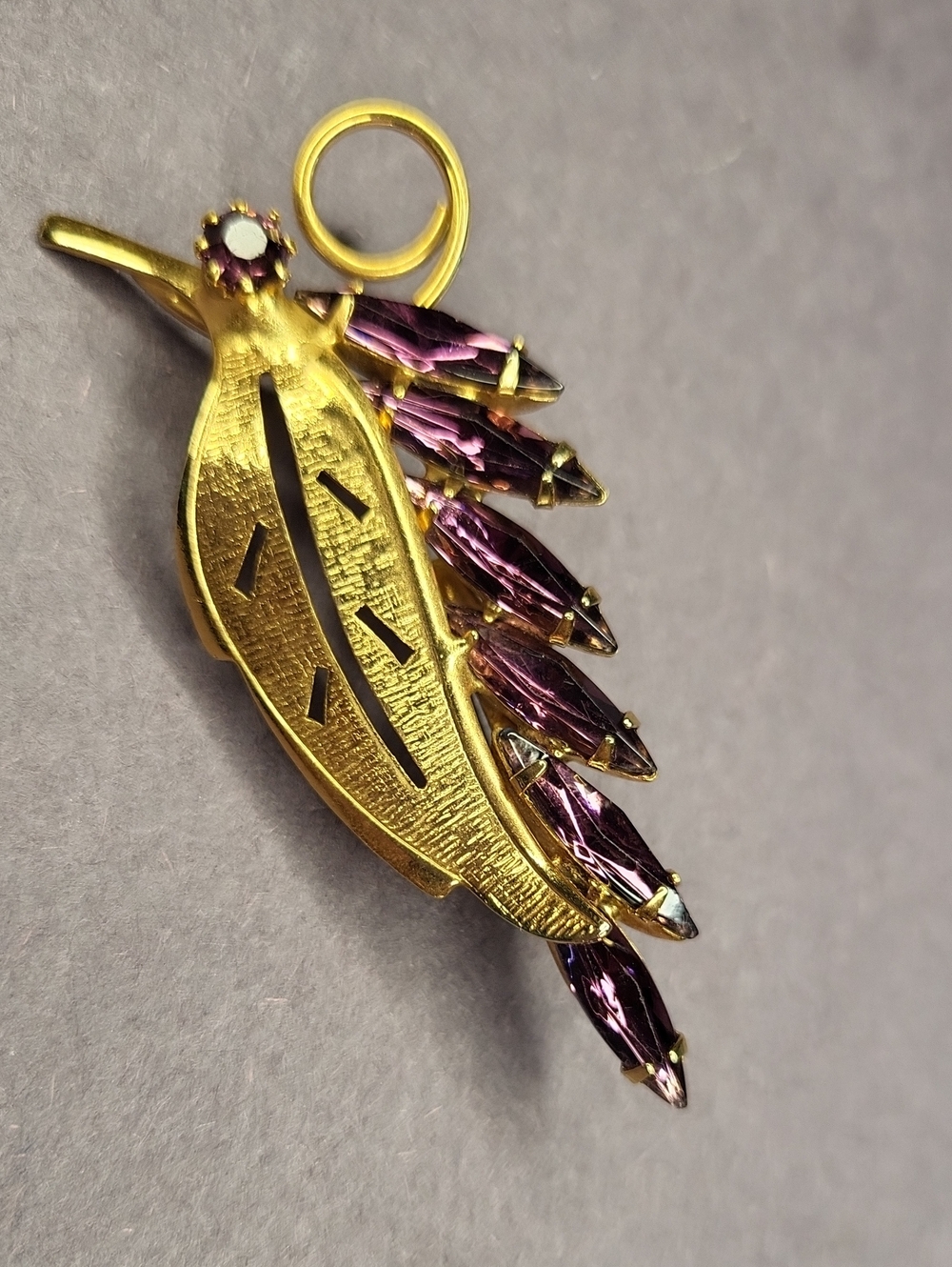 Gold Feather Brooch with Purple Stones